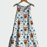 Weisses Kleid mit Highland-Rindern