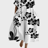 Weisses Kleid mit schwarzen Blüten