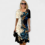 Barbara - Schwarz-blaues Kleid mit Sommerblütenmuster