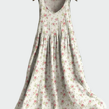 Weisses Trägerkleid mit zarten Blüten