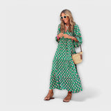 Elegantes grünes Maxikleid mit geometrischem Muster