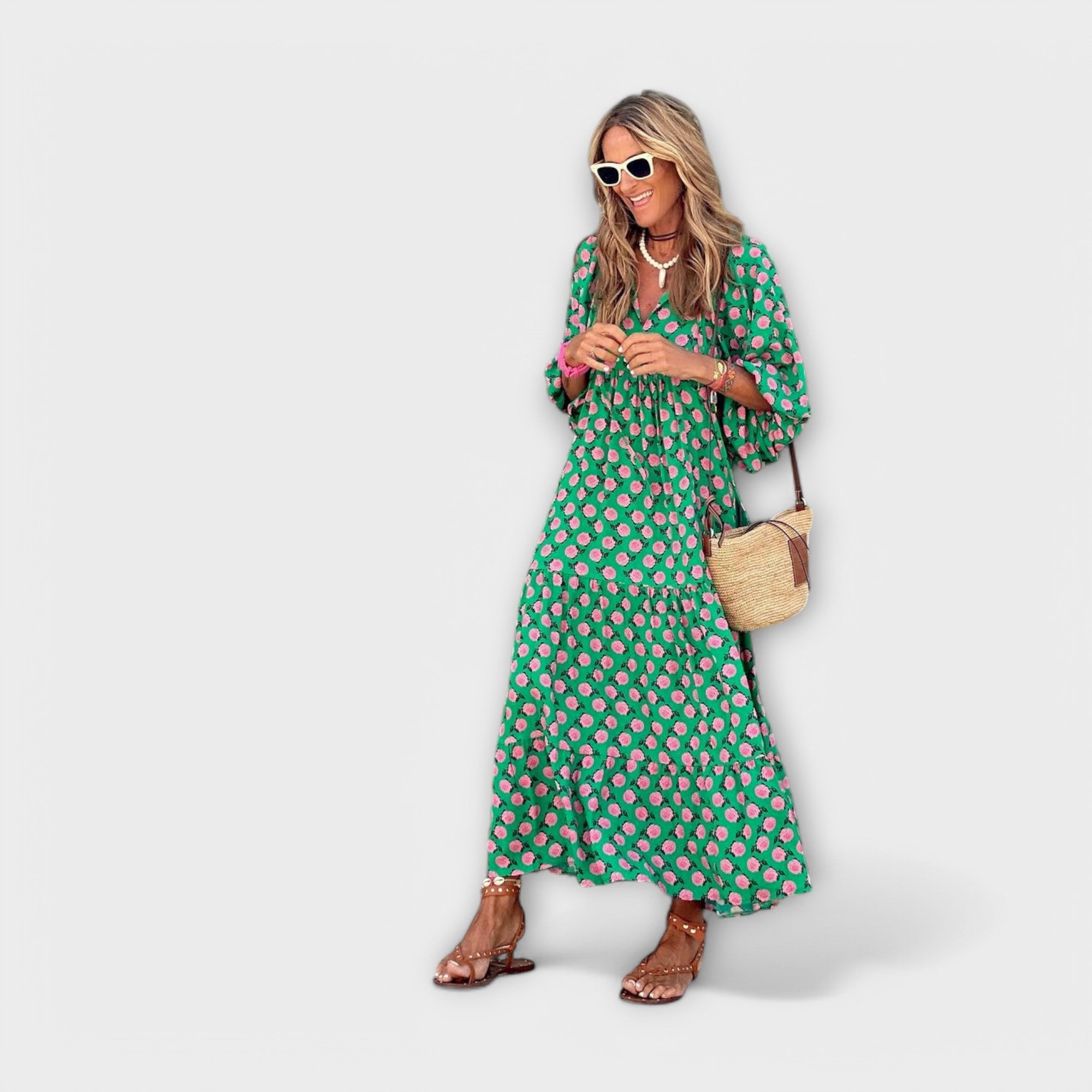 Elegantes grünes Maxikleid mit geometrischem Muster