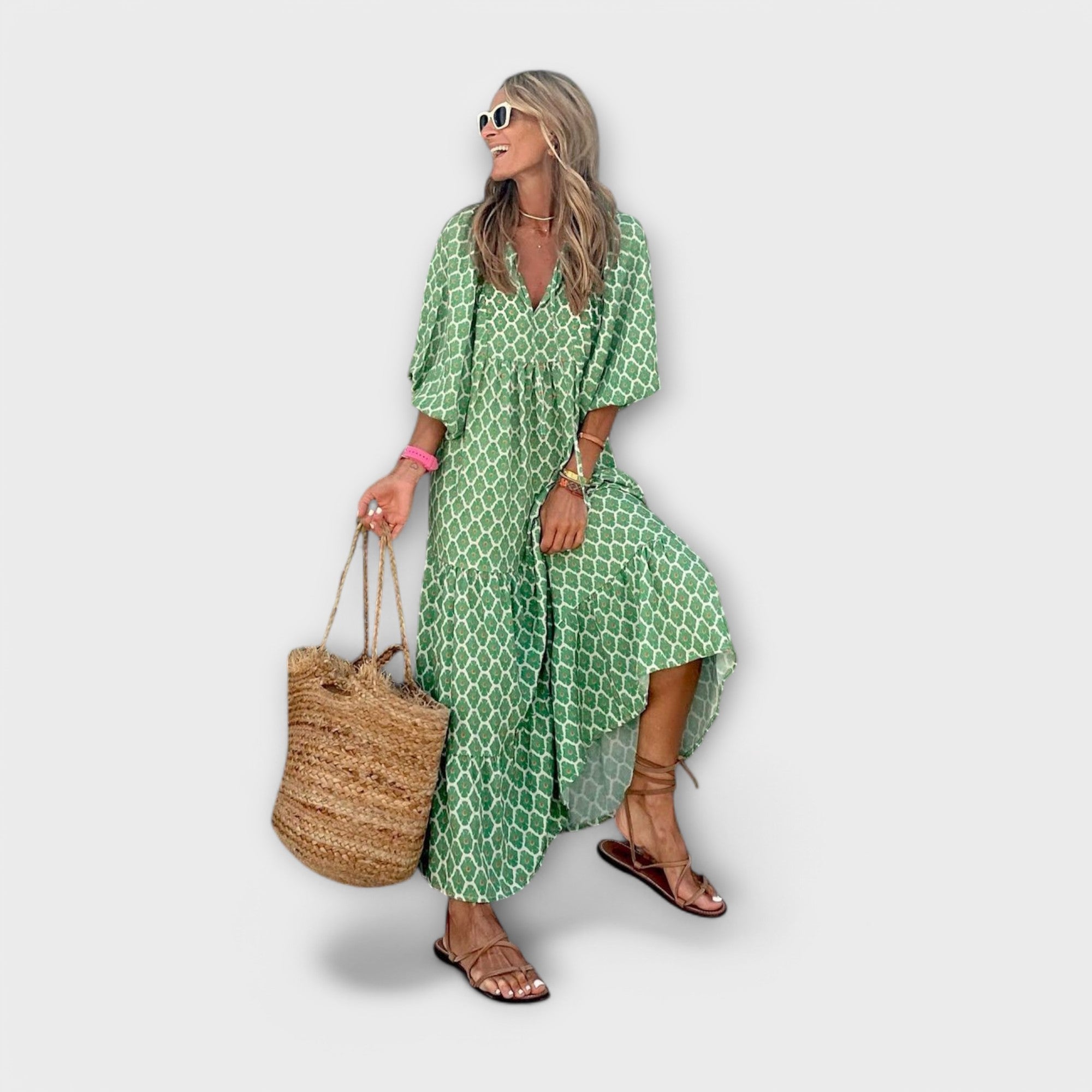 Elegantes grünes Maxikleid mit geometrischem Muster