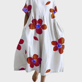 Weisses Kleid mit grünen Blüten