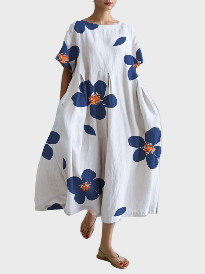 Weisses Kleid mit grünen Blüten