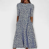 Adelina - Weisses Kleid mit blauem Blütenmuster